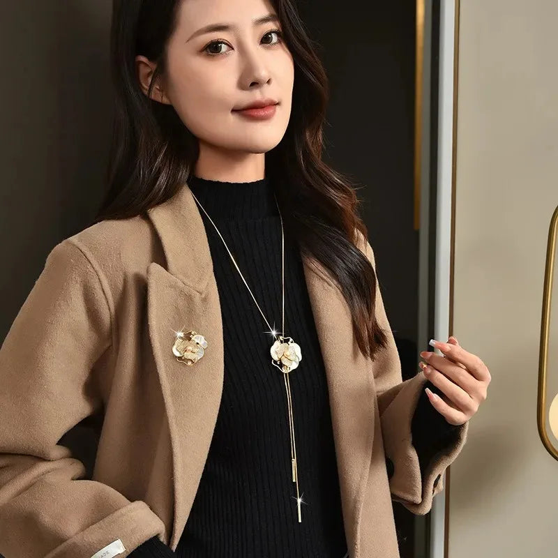 Women with long necklaces and camellias and roses, sweater chains and brooches, fashionable clothing necklaces, retro necklaces